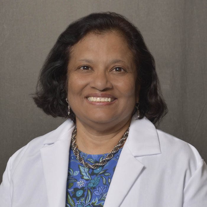 female physician with short dark hair
