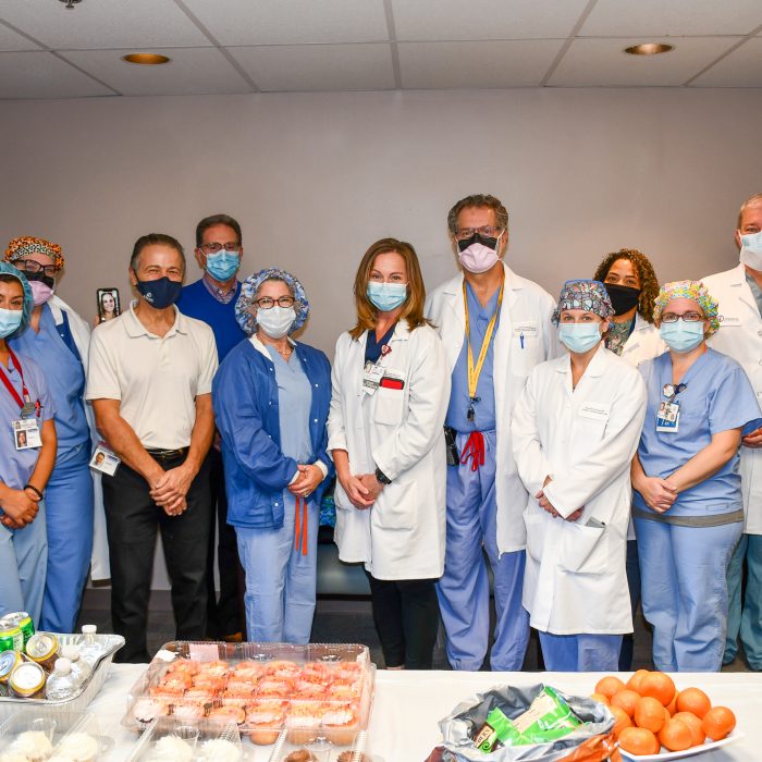 Deborah’s TAVR team celebrates a milestone. From left: Val Harris, RN; Wendy Carey, RN; Gina Schlottke, RN (virtually); Joseph Chirichella, President and CEO; Joseph Manni, Executive Vice President, Operations, COO; Jamie Rice, RN; Jennifer Joiner, MSN, APN; Richard Kovach, MD; Amanda Robbins, RT; Lorraine Kelly, LPN; Rachel Marino, RN; Paul Burns, MD