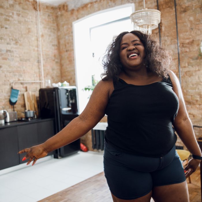Woman showing off her flat