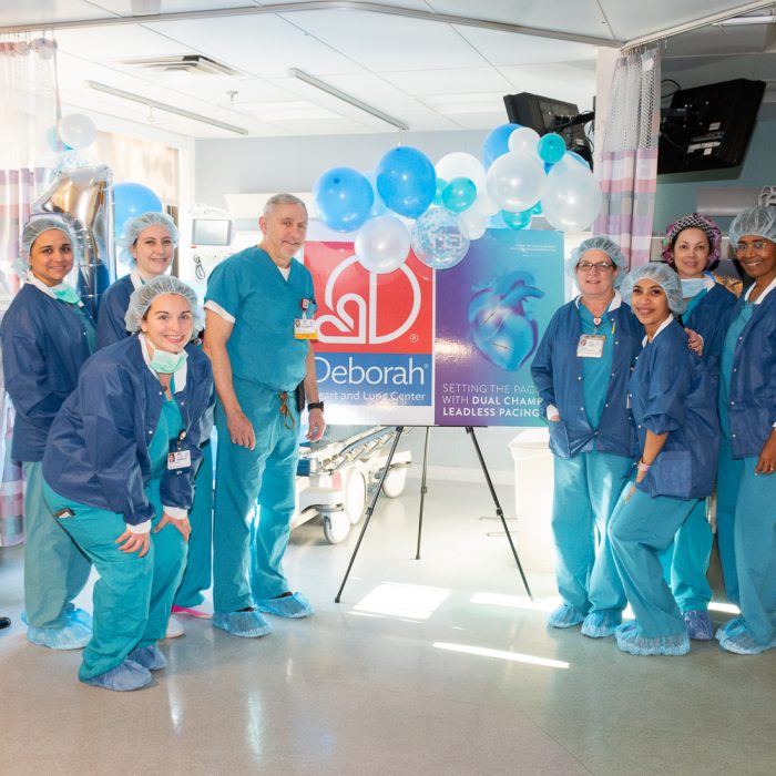 Shown is Dr. Raffaele Corbisiero (fifth from left) with the surgical team at Deborah Heart and Lung Center after a procedure to implant the Abbott AVEIR™ DR dual chamber leadless pacemaker.