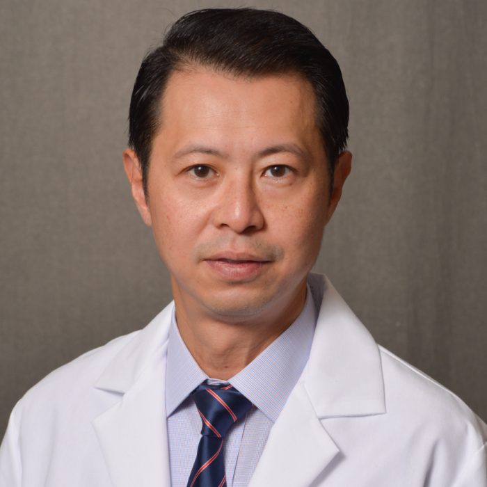male physician with dark hair