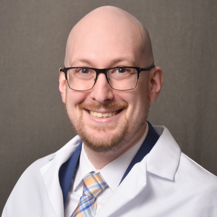 male physician in lab coat