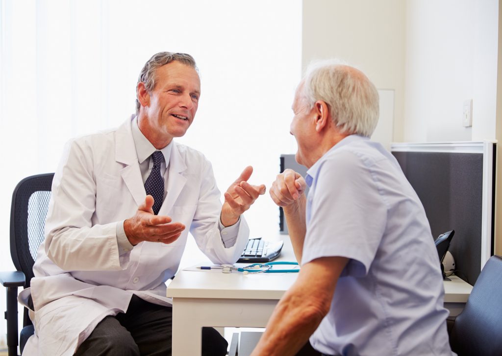 Senior man in doctor's office.