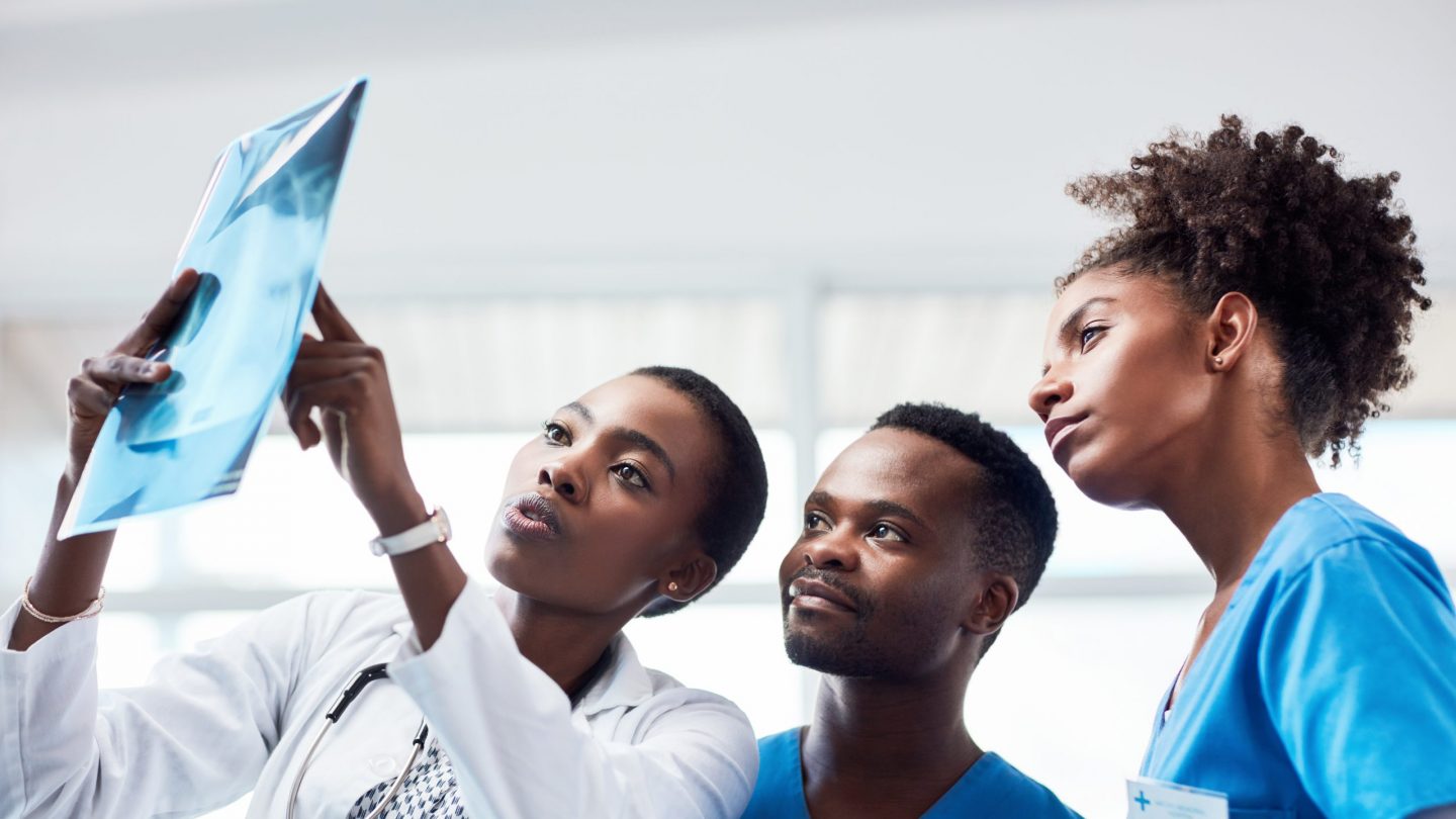 Doctors discussing the results of an xray