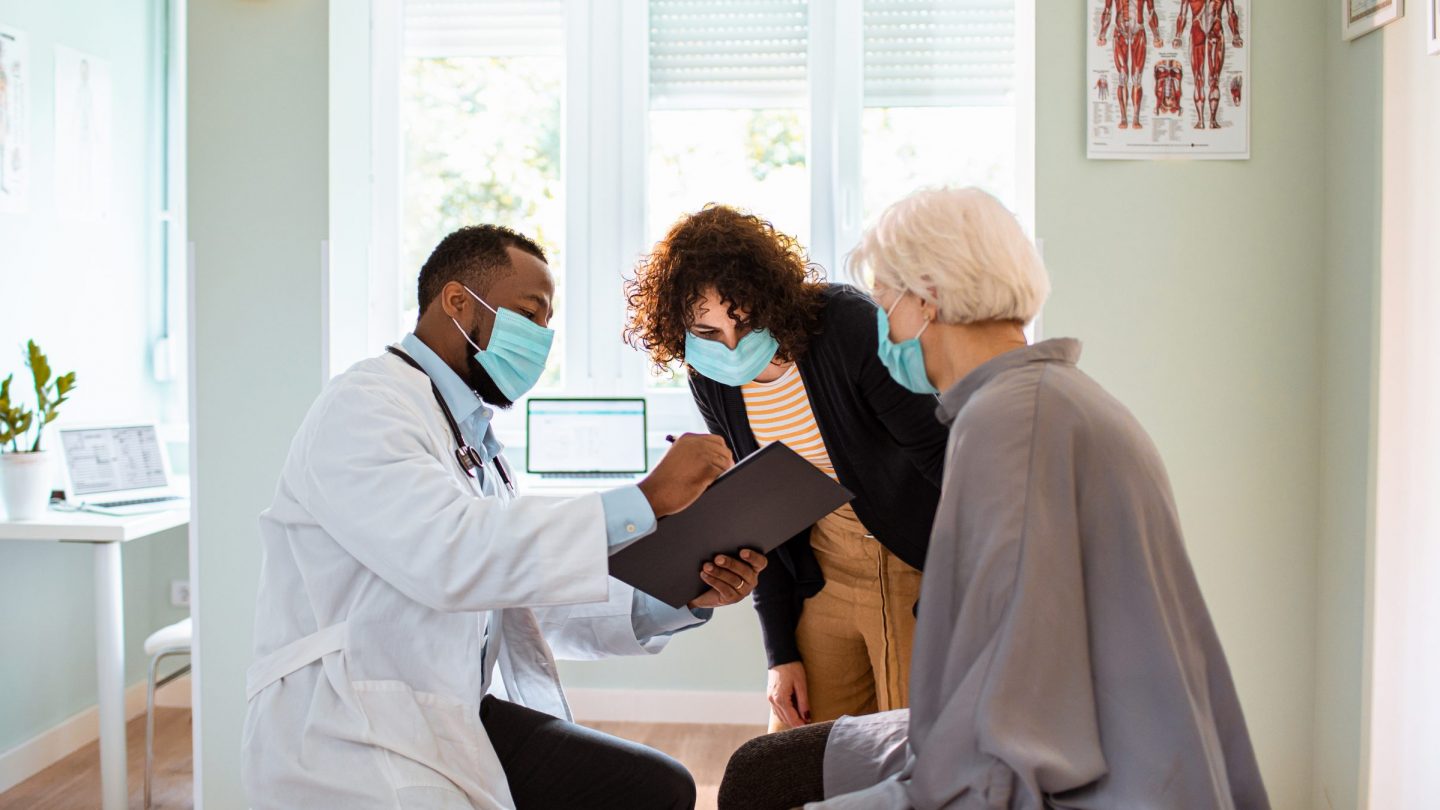 Patient and doctor wearing masks